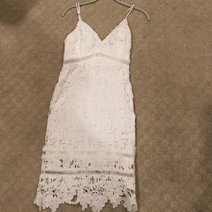 Classy and gorgeously fitting white midi dress